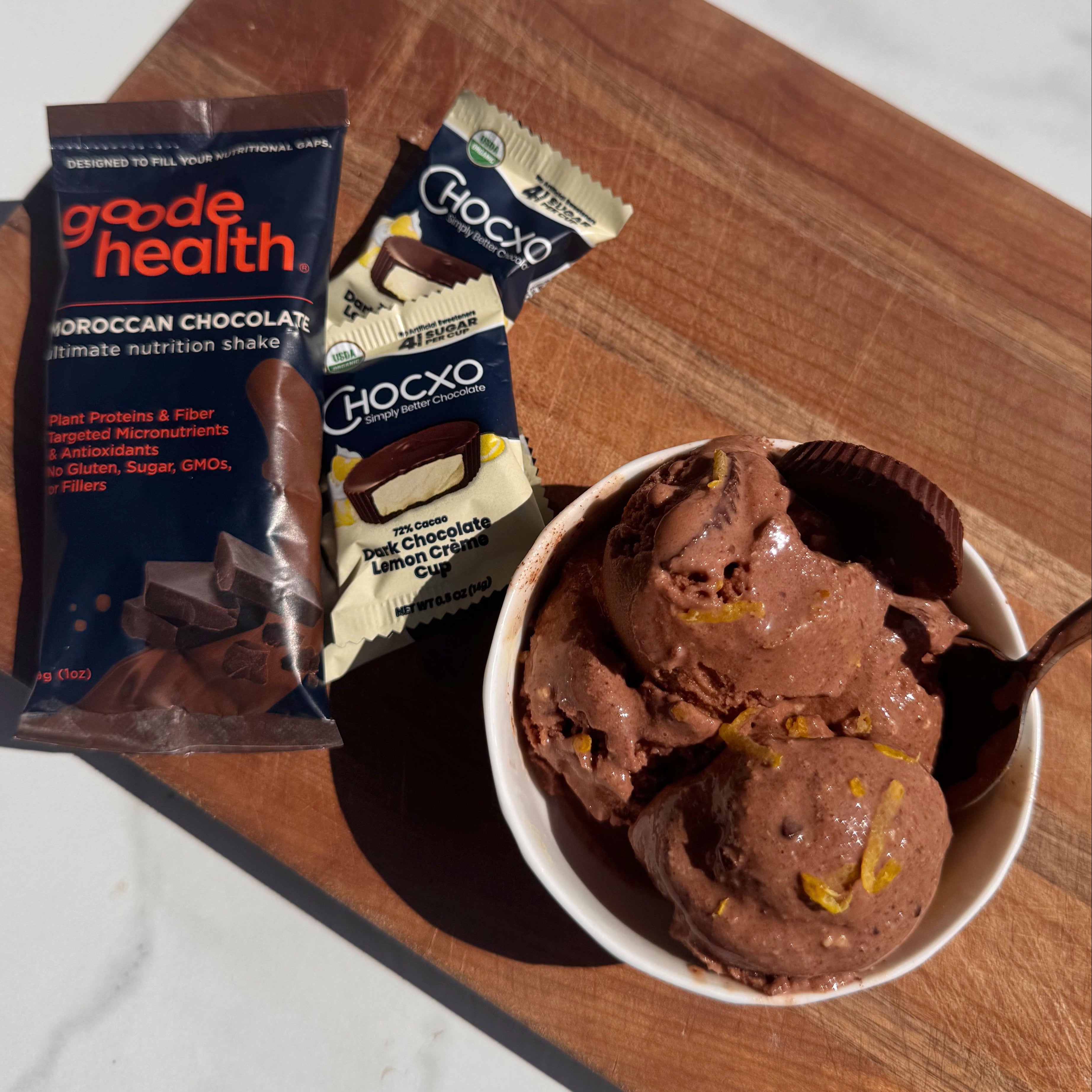 Chocolate lemon protein ice cream using Goode Health on wooden cutting board or Chocolate Lemon Protein Ice Cream