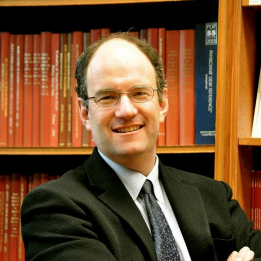 Headshot of Eric Rimm smiling and wearing a suit