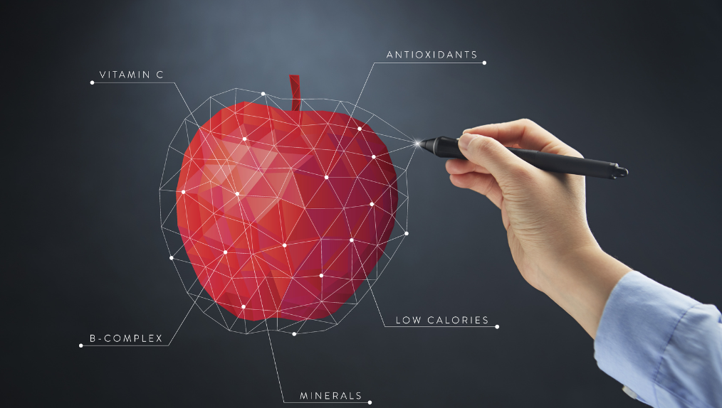 Apple graphic being edited by a hand advocating nutrient density