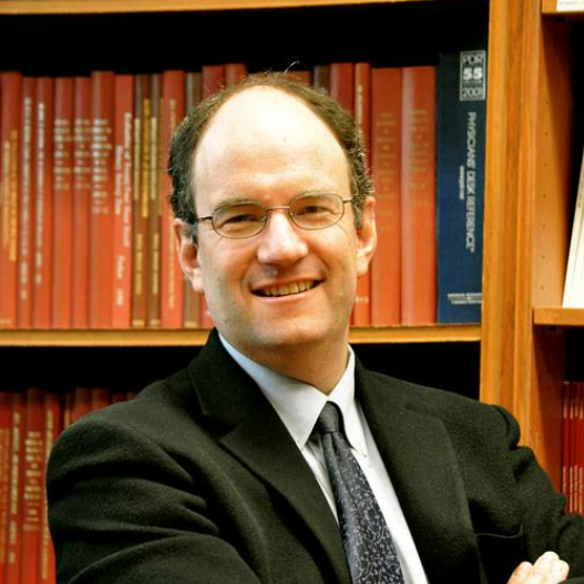 Eric Rimm headshot of him smiling and wearing a suit