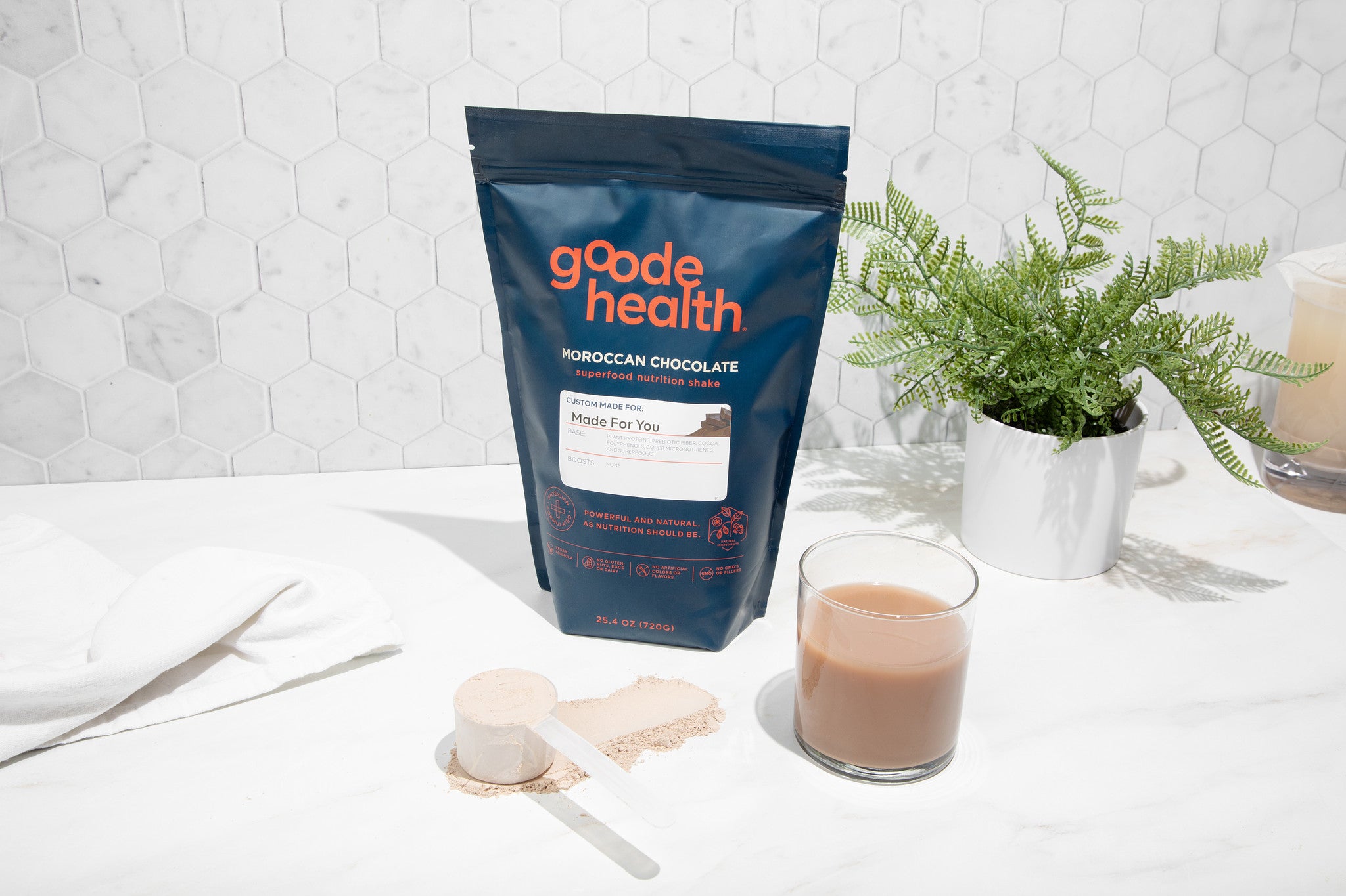 Image of Goode health bag, drink, and shaker in nice lit kitchen