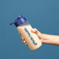 Image of woman holding full Goode health shaker 