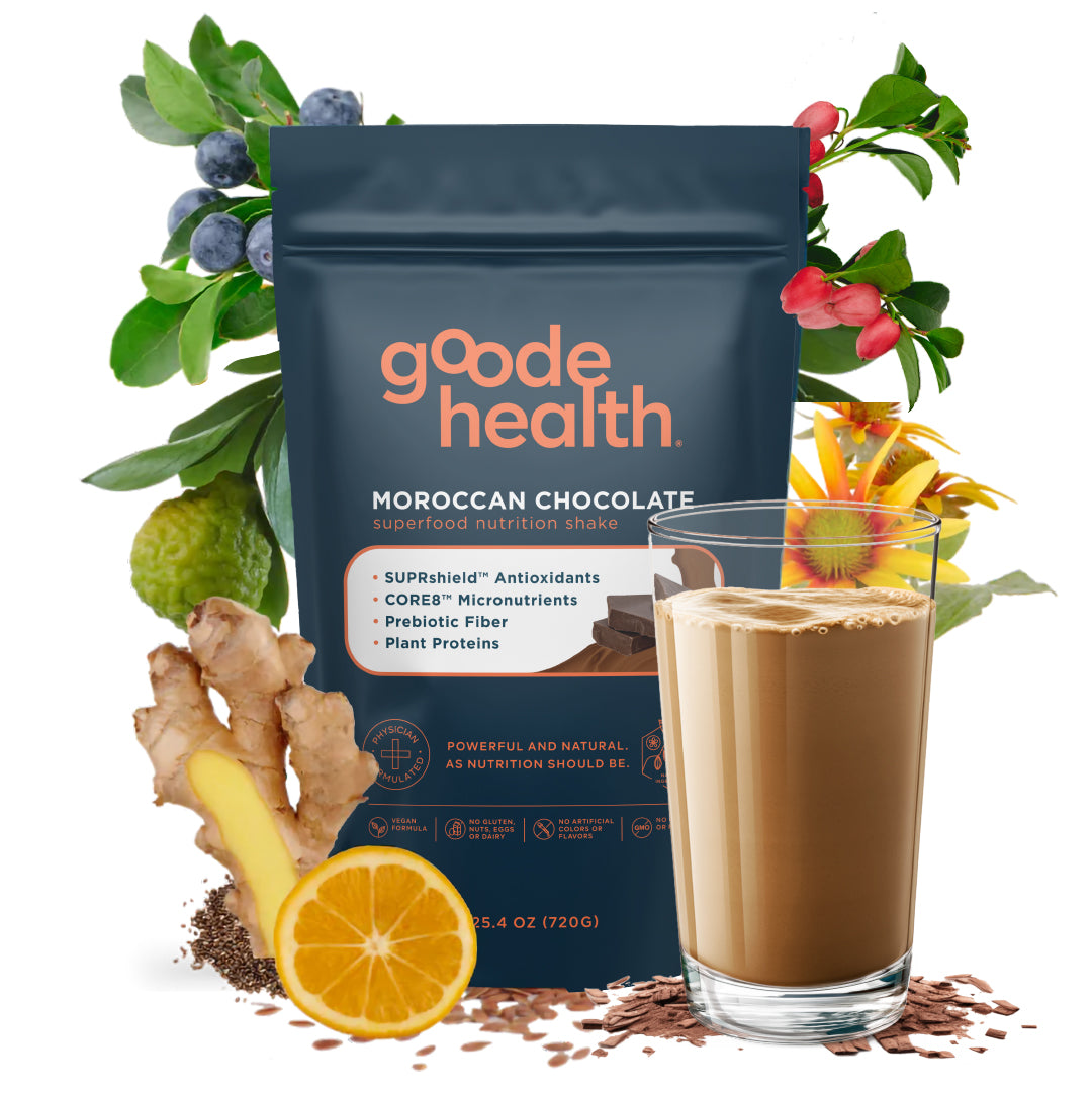 Image of Goode health Moroccan chocolate superfood nutrition blend surrounded by ingredients and shake in a glass